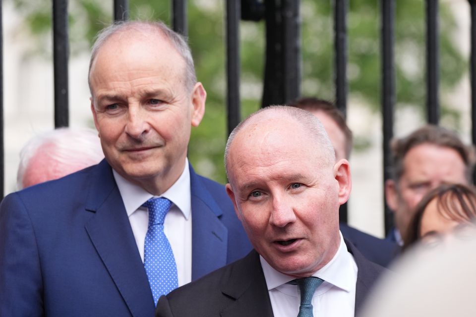 Taoiseach Micheal Martin with former Dublin Gaelic football manager Jim Gavin (Niall Carson/PA)