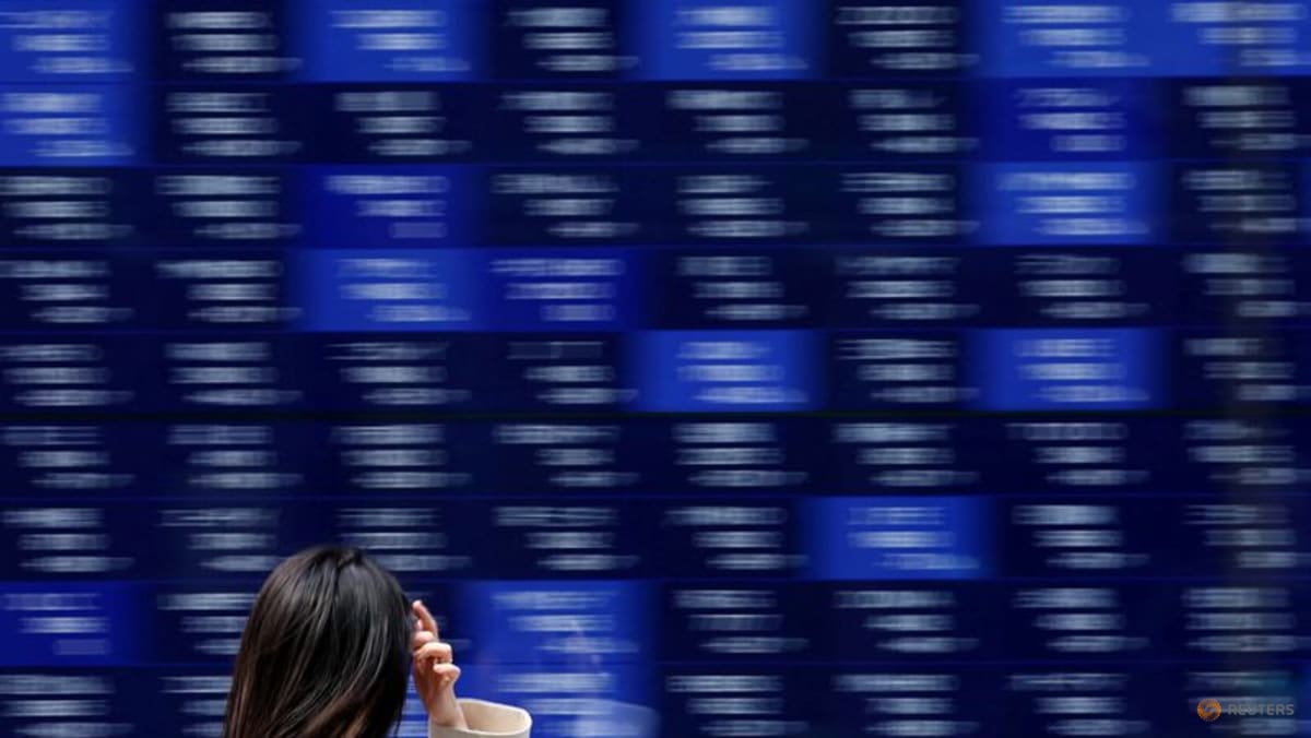 Asia stocks buoyed by AI rush, gold at fresh peaks