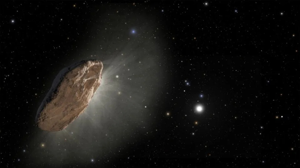  A large rocky comet floats in the darkness of space with some stars in the distance. 
