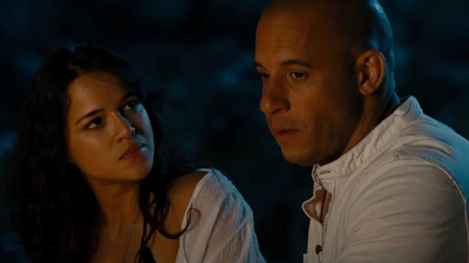  Michelle Rodriguez looking at Vin Diesel in Fast & Furious. 