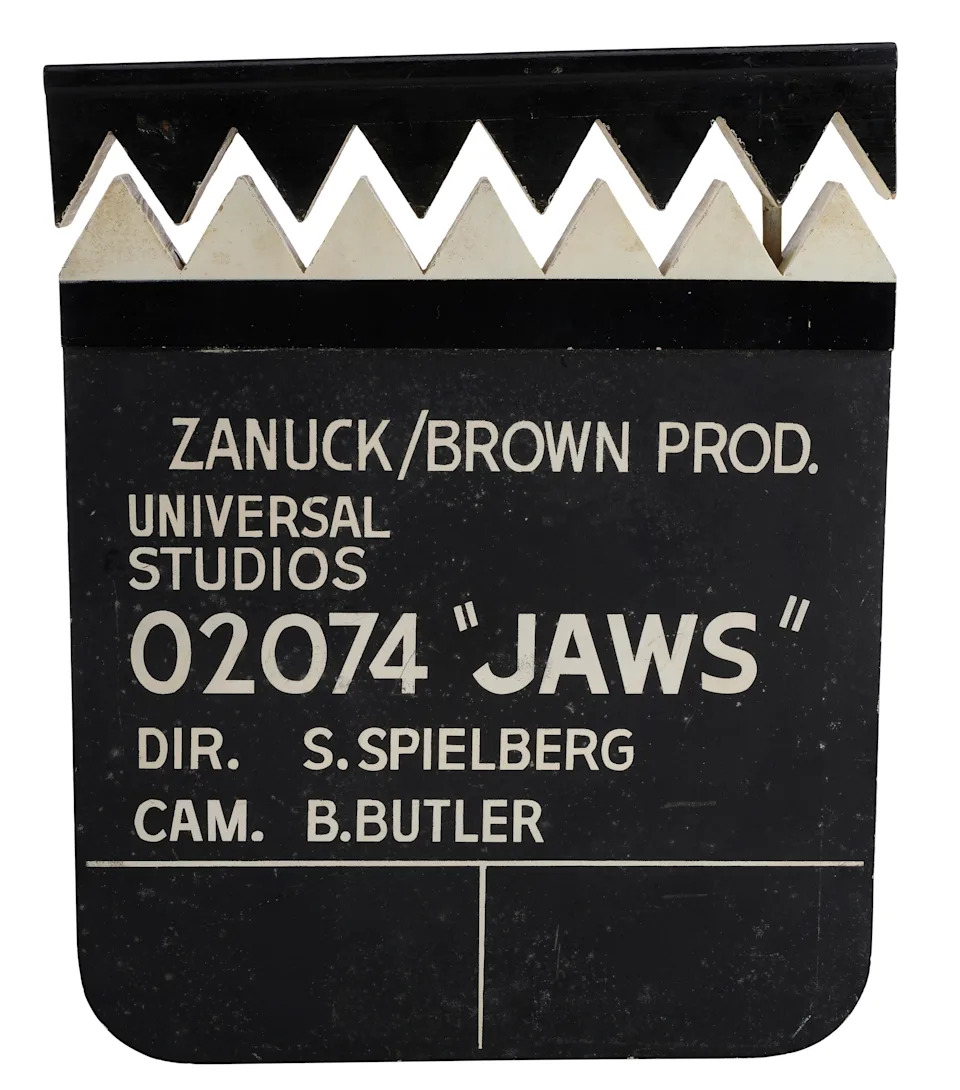 The "Jaws" Shark Tooth Clapperboard and Framed, Unpublished "Bruce" Shark Polaroids were scheduled to be auctioned off by Propstore Auction on Sept. 4, 2025. The prop's bidding starts at $20,000. The film, "Jaws" returned to theaters over Labor Day weekend and made close to $10 million at the domestic box office.