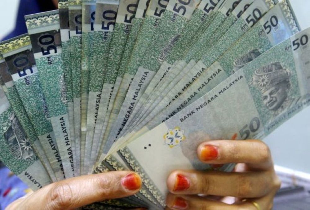 Ringgit opens slightly higher against greenback ahead of US labour market data