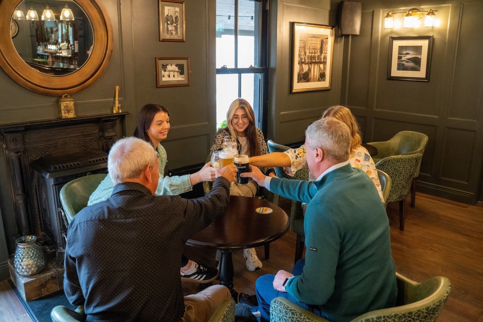 Celebrating the win of the Best Local Pub Award in the newly renovated Conran's bar