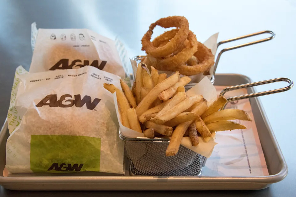 TORONTO, ONTARIO, CANADA - 2016/10/05: A &W or A and W food in a tray. A&W Restaurants, Inc., is a chain of fast-food restaurants. Nowadays,  it has franchise locations throughout much of the world, serving a typical fast-food menu of hamburgers and French fries. (Photo by Roberto Machado Noa/LightRocket via Getty Images)