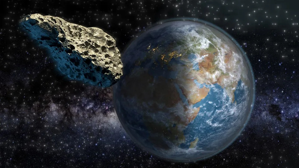  An artist's illustration of an asteroid passing Earth at a large distance. 