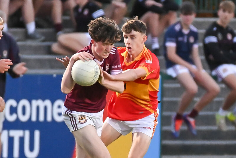 Éire Óg's Cian O'Flynn tackles Bishopstown's Rob Clinton. Picture: David Keane