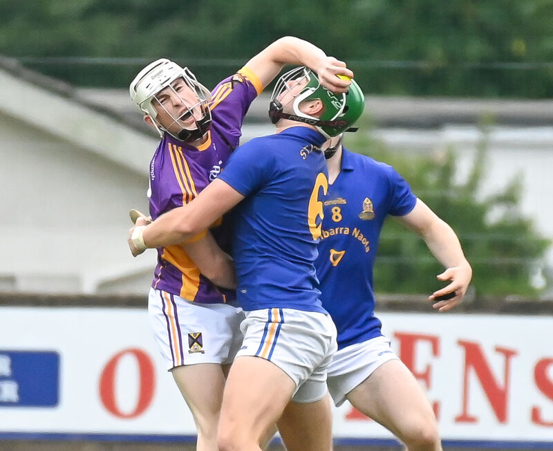 St Catherine's Sean O'Donoghue in a clash with St Finbarr's Luke Hannigan. Picture: David Keane.  St Catherine's Sean O'Donoghue in a clash with St Finbarr's Luke Hannigan. Picture: David Keane.