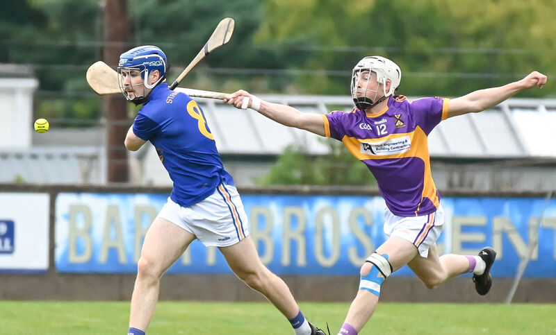 St Catherine's Sean O'Donoghue tries to hook St Finbarr's Conor McCarthy. Picture: David Keane.  St Catherine's Sean O'Donoghue tries to hook St Finbarr's Conor McCarthy. Picture: David Keane.