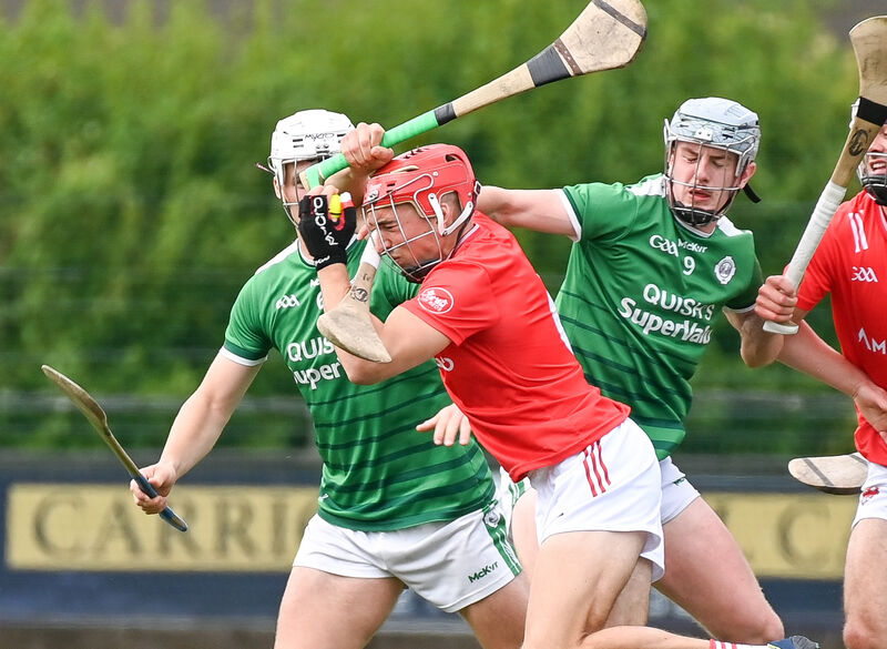 Castlemartyr's Ciaran Joyce is tackled by Ballincollig's Theo Morgan, during their Premier IHC clash at Carrigtwohill.  Castlemartyr's Ciaran Joyce is tackled by Ballincollig's Theo Morgan, during their Premier IHC clash at Carrigtwohill.