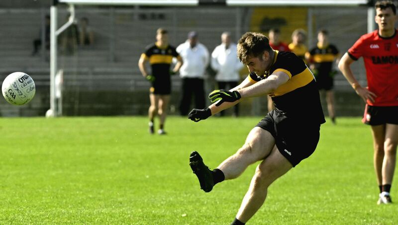  Dr Crokes' Bily Courtney converts the first of two 45s in the first half of their Kerry Club SFC semi-final in Tralee on Sunday. They will face Na Gaeil in next Sunday's decider