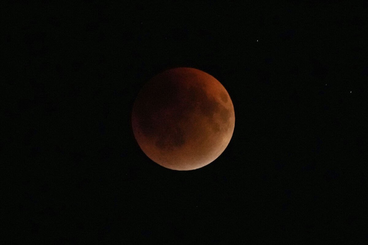 The moon turns red during a lunar eclipse in Kolkata, India. Picture: AP Photo/Bikas Das The moon turns red during a lunar eclipse in Kolkata, India. Picture: AP Photo/Bikas Das