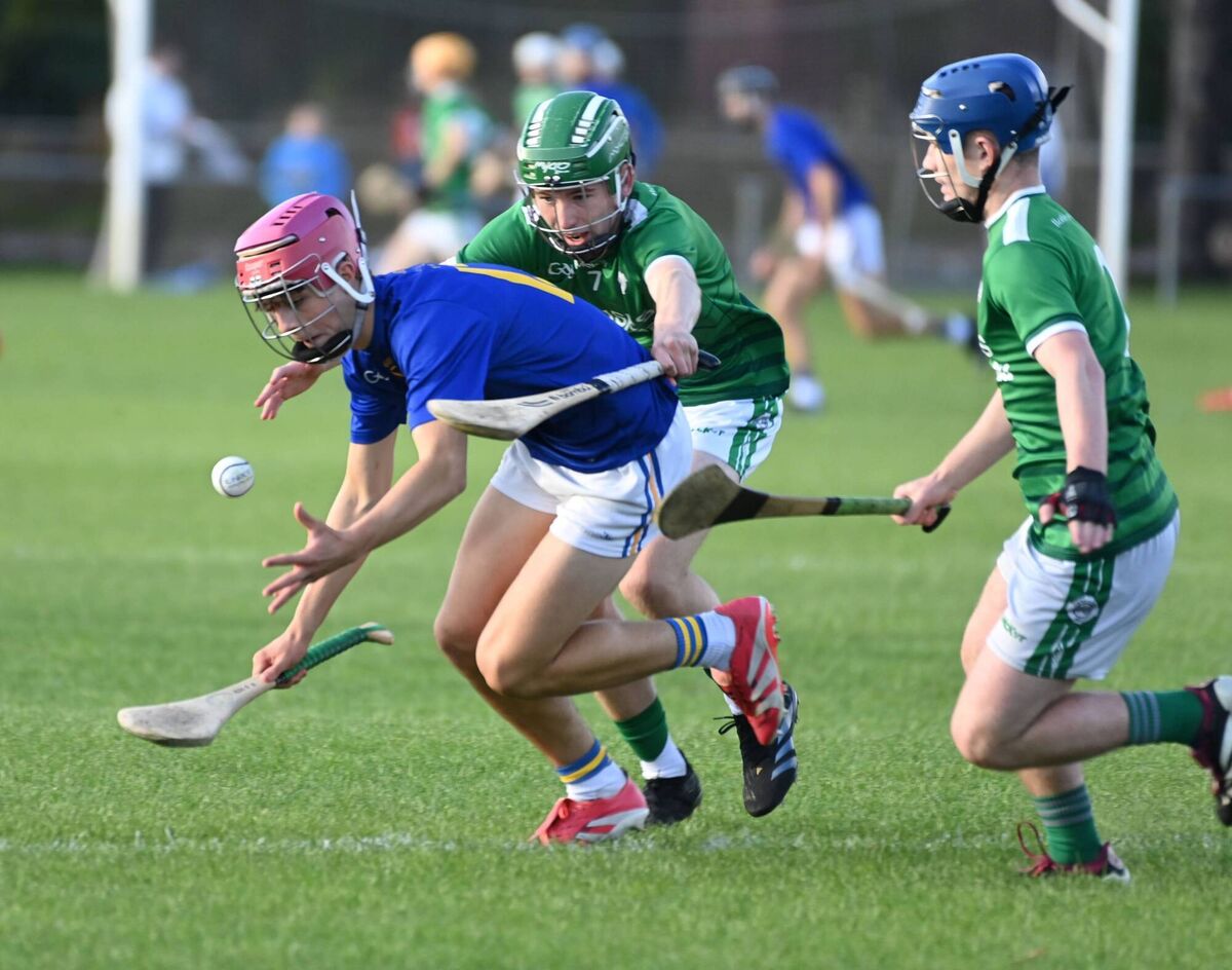 St Finbarr's Alex O'Herlihy gathers the sliotar from Ballincollig's Scott Richmond and Eoin Harris. Picture: Eddie O'Hare St Finbarr's Alex O'Herlihy gathers the sliotar from Ballincollig's Scott Richmond and Eoin Harris. Picture: Eddie O'Hare