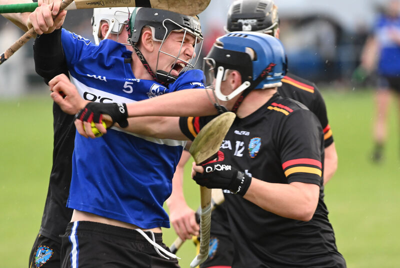 Sarsfields' Eoin Considine bursting through St Colman's Alex Noble and Darragh Heavin. Picture: Eddie O'Hare Sarsfields' Eoin Considine bursting through St Colman's Alex Noble and Darragh Heavin. Picture: Eddie O'Hare