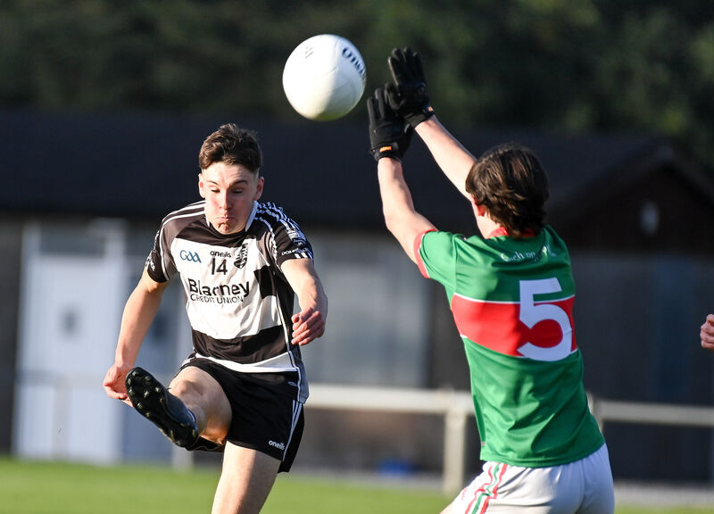 Donoughmore's Daniel Holland scores a point past Clonakilty's Derry O'Donovan during their Premier 2 MFC clash at the Mardyke. Picture: David Keane  Donoughmore's Daniel Holland scores a point past Clonakilty's Derry O'Donovan during their Premier 2 MFC clash at the Mardyke. Picture: David Keane