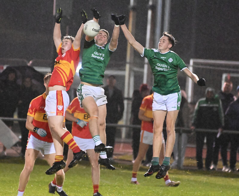 Ballincollig's Luke O'Mahony and Brian Cronin and Éire Óg's Jack O'Connell go high for the ball. Picture: Eddie O'Hare Ballincollig's Luke O'Mahony and Brian Cronin and Éire Óg's Jack O'Connell go high for the ball. Picture: Eddie O'Hare