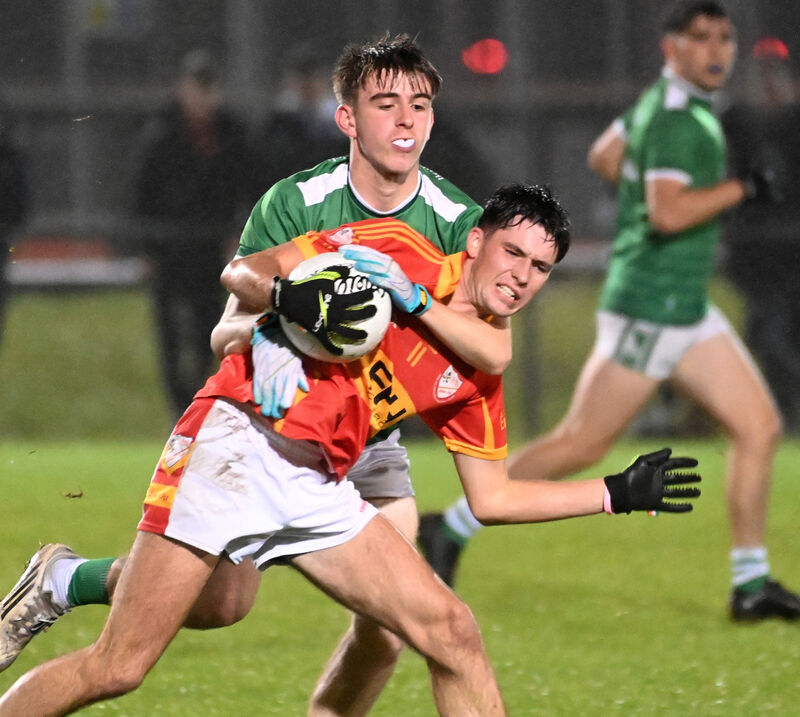 Éire Óg's Seán Murphy is tackled by Ballincollig's Darragh Crowley. Picture: Eddie O'Hare Éire Óg's Seán Murphy is tackled by Ballincollig's Darragh Crowley. Picture: Eddie O'Hare