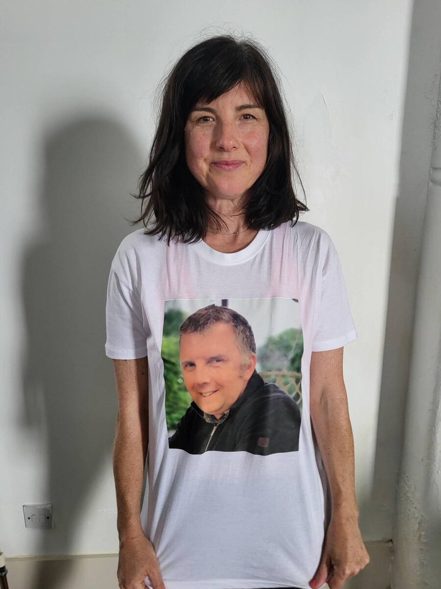Elizabeth Doherty with a photo of brother, Tom.
