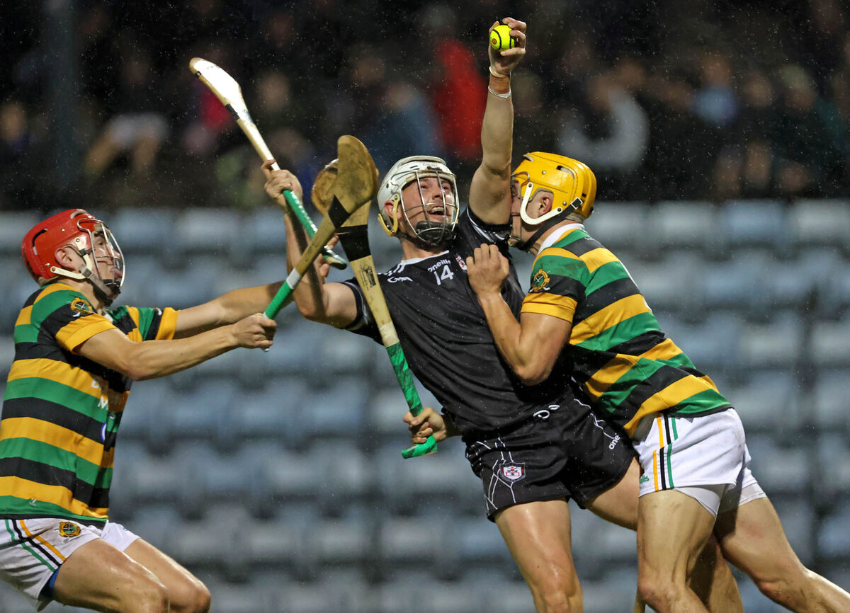 Glen Rovers pair Conor McCarthy and Micheál Mullins put pressure on Midleton's Cormac Beausang. Picture: Jim Coughlan Glen Rovers pair Conor McCarthy and Micheál Mullins put pressure on Midleton's Cormac Beausang. Picture: Jim Coughlan