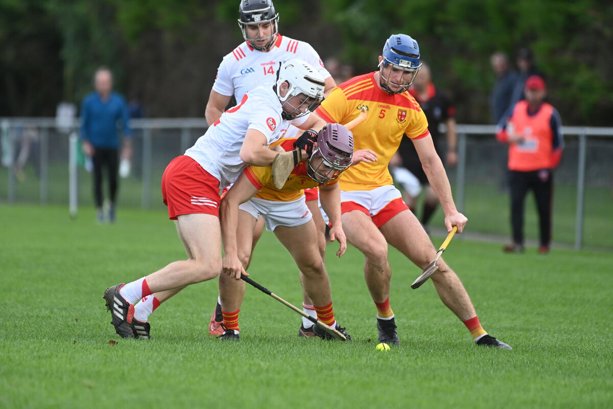 Mallow defenders Gearoid Daly and Garrett Linehan under pressure from Billy McGann, Castlemartyr. Picture: Larry Cummins  Mallow defenders Gearoid Daly and Garrett Linehan under pressure from Billy McGann, Castlemartyr. Picture: Larry Cummins