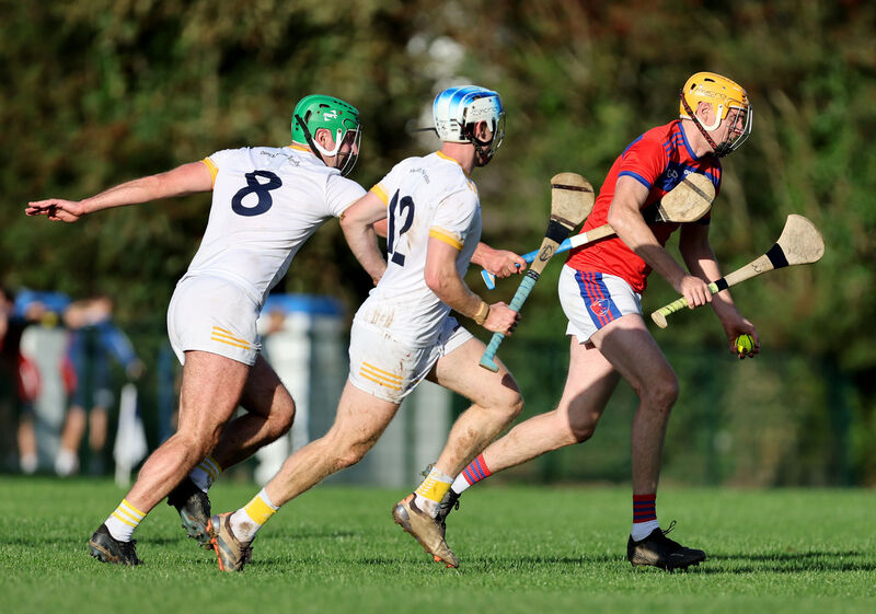 Michael Cahalane and Conor Calnan, Bandon, tackling Ian O'Mahony, Erin's Own. Picture: Jim Coughlan.  Michael Cahalane and Conor Calnan, Bandon, tackling Ian O'Mahony, Erin's Own. Picture: Jim Coughlan.