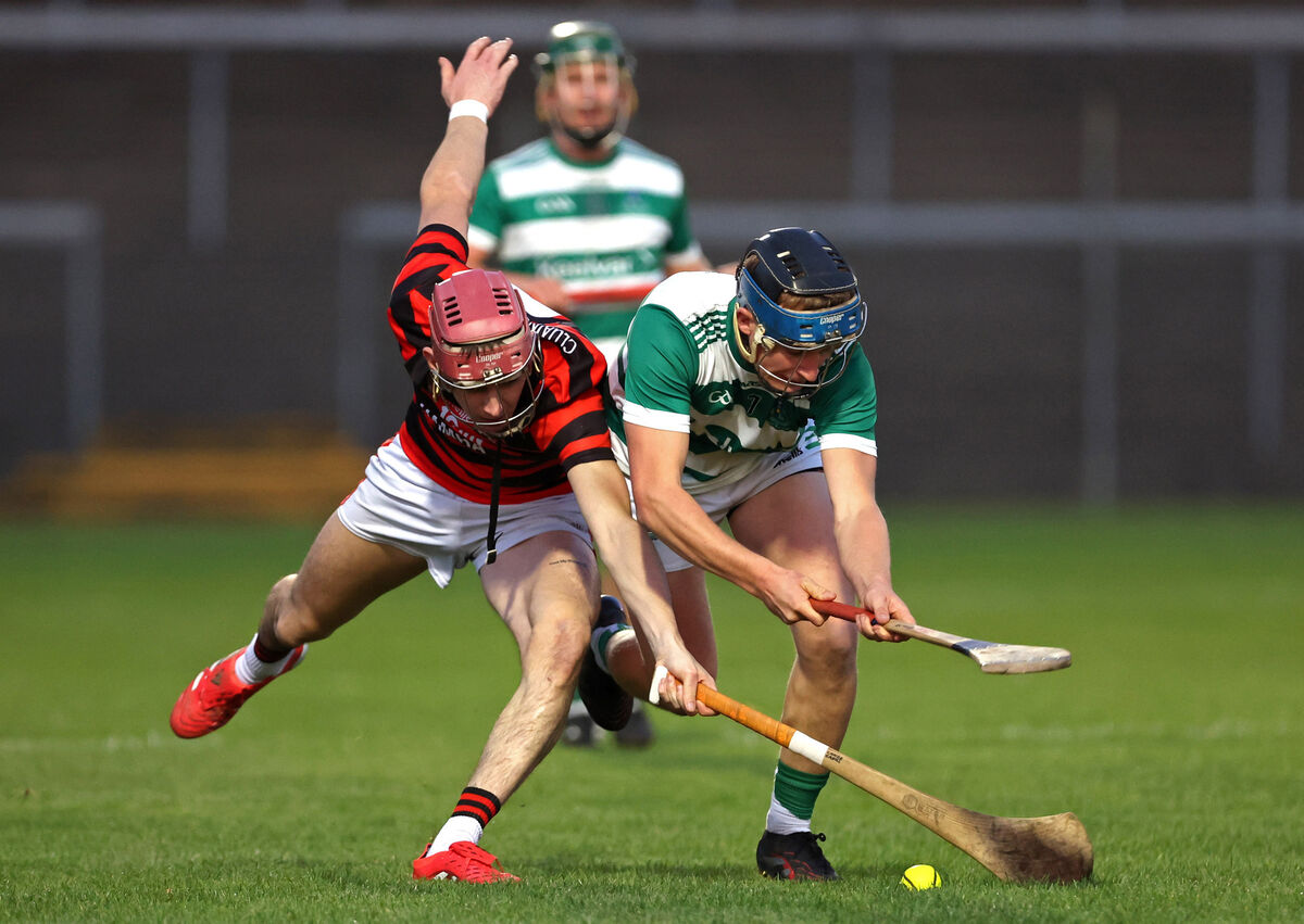  Conor Cahill of Cloyne and Brian McCarthy of Valley Rovers. Picture: Jim Coughlan
