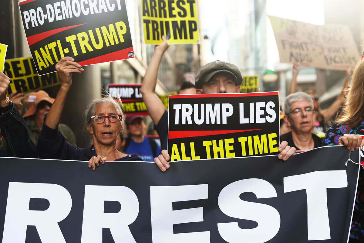 Protesters hold up signs as they march and attempt to block a street during the 80th session of the United Nations General Assembly in New York. Picture: Heather Khalifa/AP