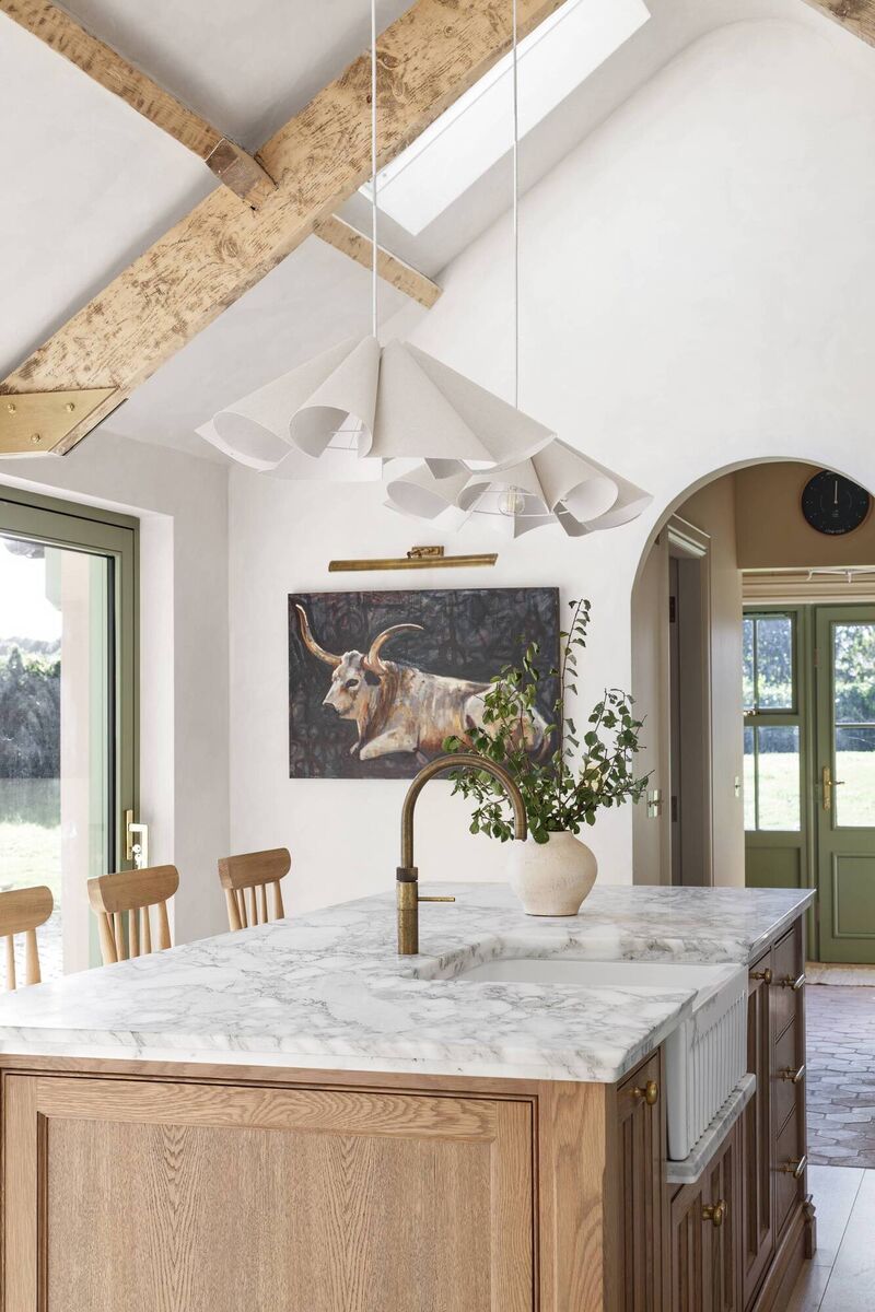 Geri O'Toole used light to to tie the home's rhythm to that of the landscape outside, she says. Geri O'Toole used light to to tie the home's rhythm to that of the landscape outside, she says.