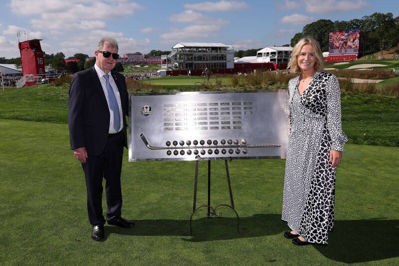 JP McManus and daughter Sue Ann Foley participate in the Ceremonial Putter Handover at Bethpage State Park Golf Course on Sunday. 