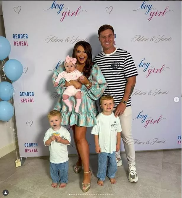 Charlotte Dawson and family at event with blue balloons