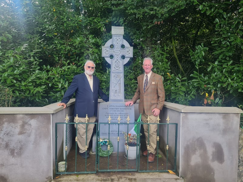 Tim and Tom Kennefick at the monument to their grandfather Capt Timothy Kennefick in Coachford, Co Cork. Photograph: Barry Roche