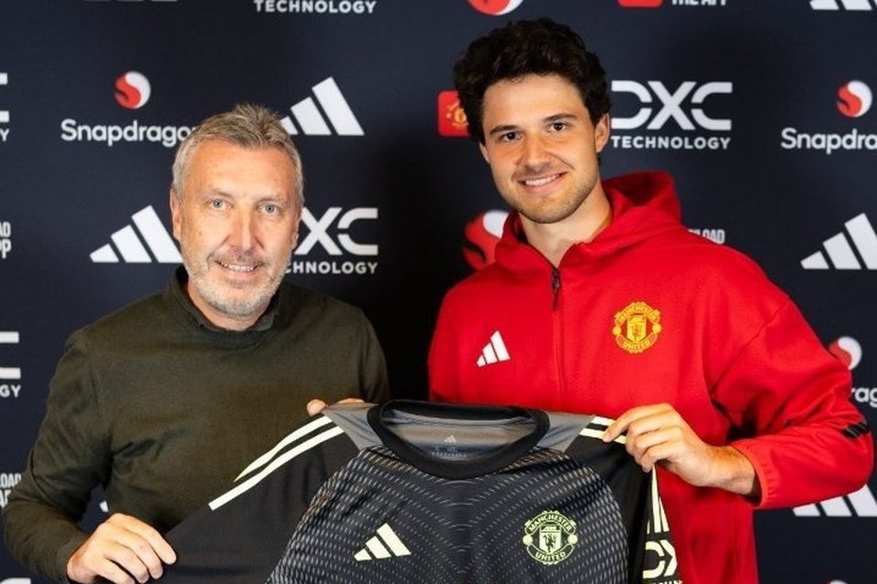 Manchester United director of football Jason Wilcox with new goalkeeper Senne Lammens.