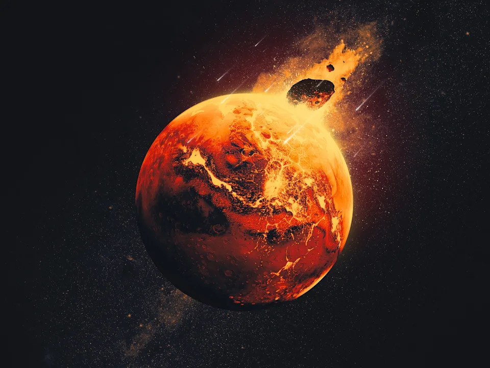 NASA/JPL-Caltech - PHOTO: This illustration depicts a giant asteroid striking Mars 4.5 billion years ago. A cataclysmic impact like this one could have formed lumps of debris that now lie scattered throughout the Martian mantle.