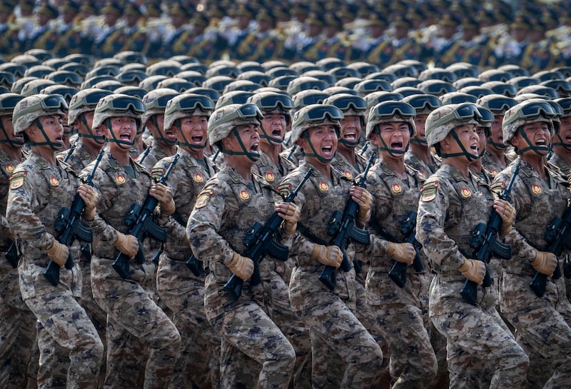 Chinese soldiers shout during a military parade marking the 80th anniversary of victory over Japan and the end of the second World War, in Tiananmen Square, Beijing. Photograph: Kevin Frayer/Getty Images