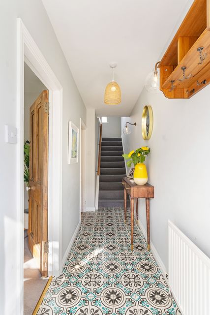 The entrance hall, with tiled floor