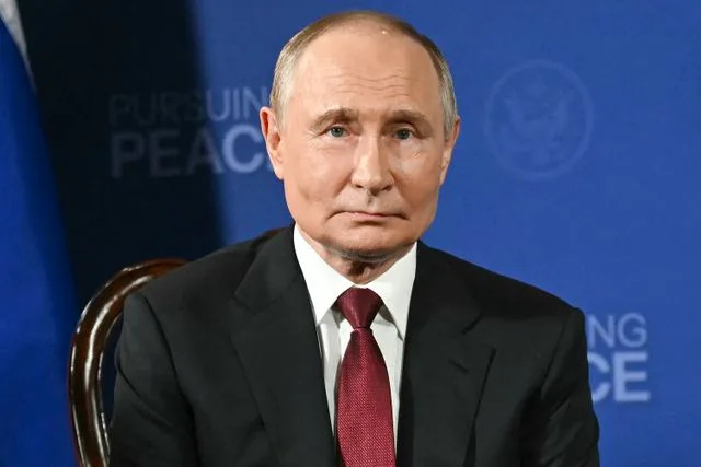 ANDREW CABALLERO-REYNOLDS/AFP via Getty Vladimir Putin