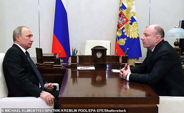 Russian President Vladimir Putin (left) meets with Vladimir Potanin (right) in the residence in Novo-Ogaryovo outside Moscow, Russia, 10 December 2018