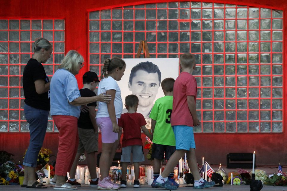 People attend a vigil in the Utah town of Otem where Charlie Kirk was shot at a university event. Photo: Jim Urquhart/Reuters