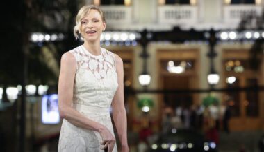 Princess Charlene of Monaco Golfs in White Lace Dress