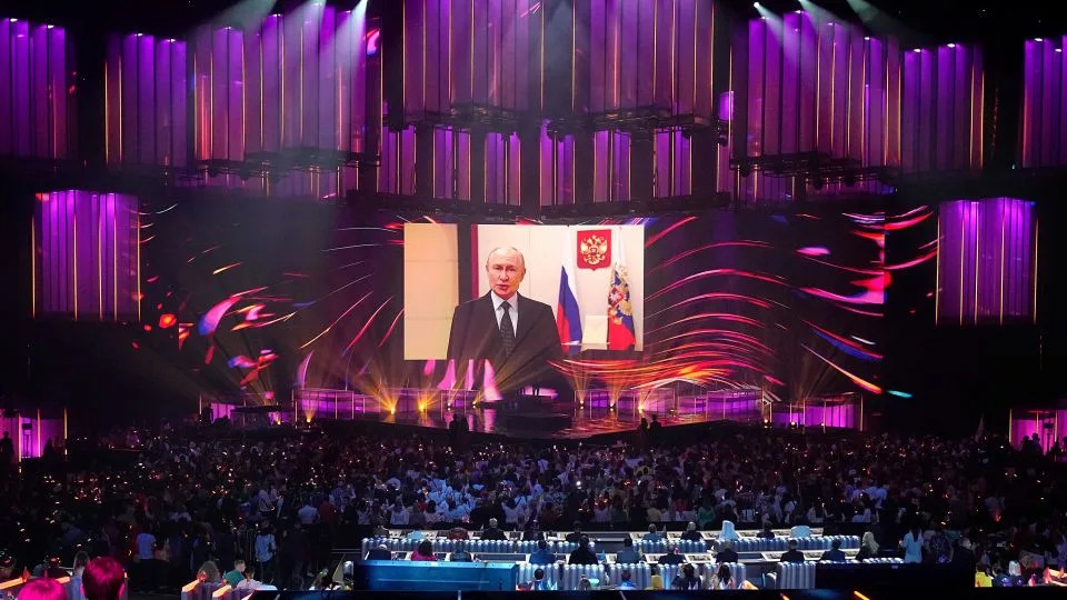 Russian President Vladimir Putin addresses participants and spectators of "Intervision" via video link Saturday. - Alexander Zemlianichenko/AP