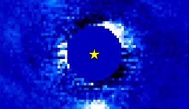 Growth of baby planet: Blue solid circle with yellow star in the center. Pixelated white patches are around the edge of the circle.