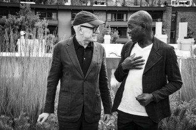 Candid photo of curator Hans Ulrich Obrist (left) and architect Francis Kéré.