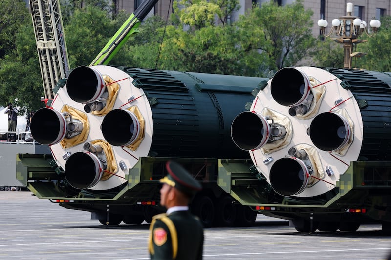 Armoured vehicles carrying the DF-5C liquid-fueled intercontinental strategic nuclear missiles. Photograph: EPA