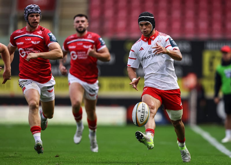 Munster's Thaakir Abrahams makes a break against Scarlets. Photograph: Ben Brady/Inpho