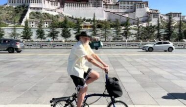 Meet the 82-year-old Belfast man cycling across China to understand how villages vote – The Irish Times