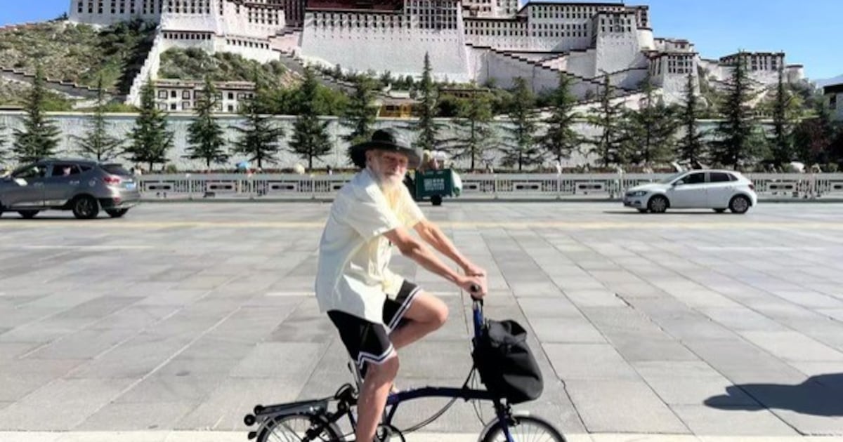 Meet the 82-year-old Belfast man cycling across China to understand how villages vote – The Irish Times