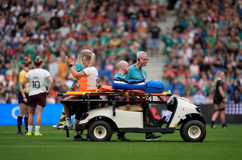 Ireland's Stacey Flood applauds the fans as she is taken from the field with an injury against New Zealand. Photograph: Andrew Matthews/PA Wire
