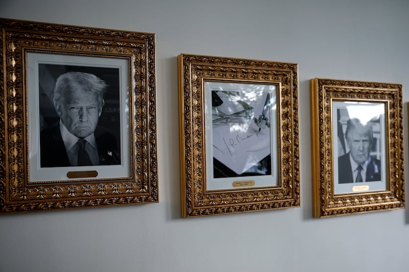 Framed portraits of US president Donald Trump flank an image of former US president Joe Biden's signature along the presidential walk of fame at the White House. Photograph: Kevin Dietsch/Getty Images