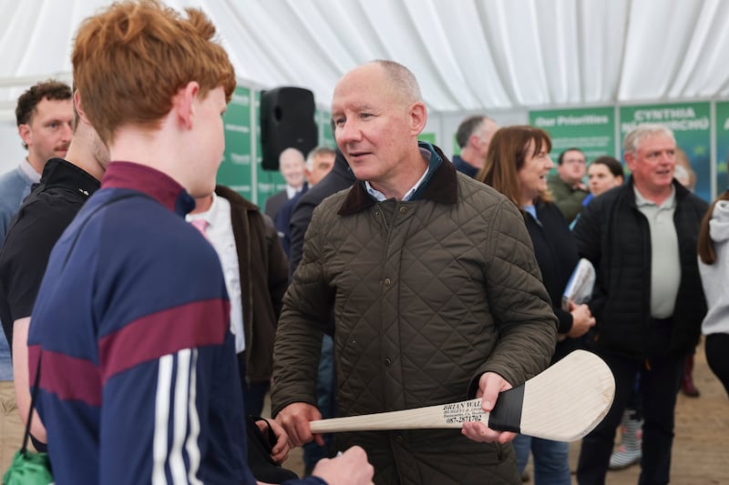 Fianna Fáil presidential candidate and former Dublin football manager Jim Gavin meets attendees. Photograph: Dan Dennison
