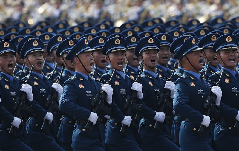Chinese troops march in Beijing, China. Photograph: EPA