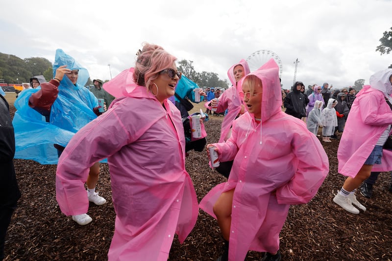 Helen Nolan and Lauren Maher from Laois enjoying the performance of the Tinahely Mens Choir on Sunday. Photograph: Alan Betson